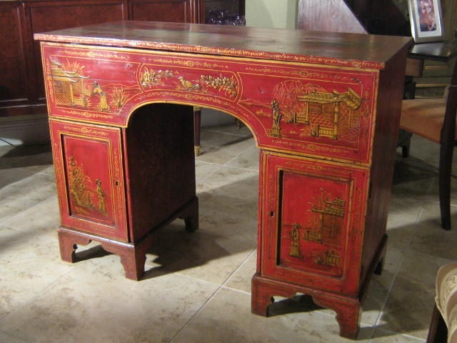 Red Lacquered chinoiserie English 19th century campaign style desk.