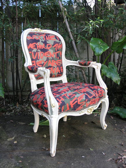 Louis the Fifteenth style chair with Stephan Sprouse Camo Graffiti fabric with fragments of 'The Declaration of Independance', as seen in the images above and below.  This offering was conceived by Sheri Sheridan and Nathan Brown of Disfigure