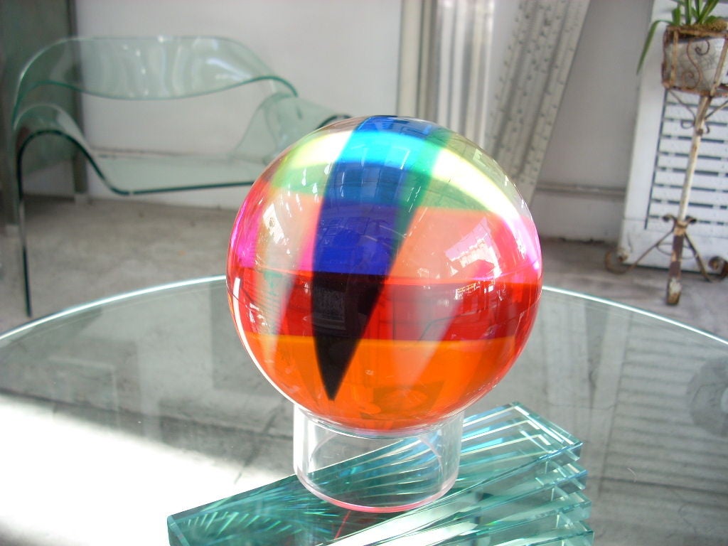 This is a fabulous original signed Vasa sphere on a lucite base.