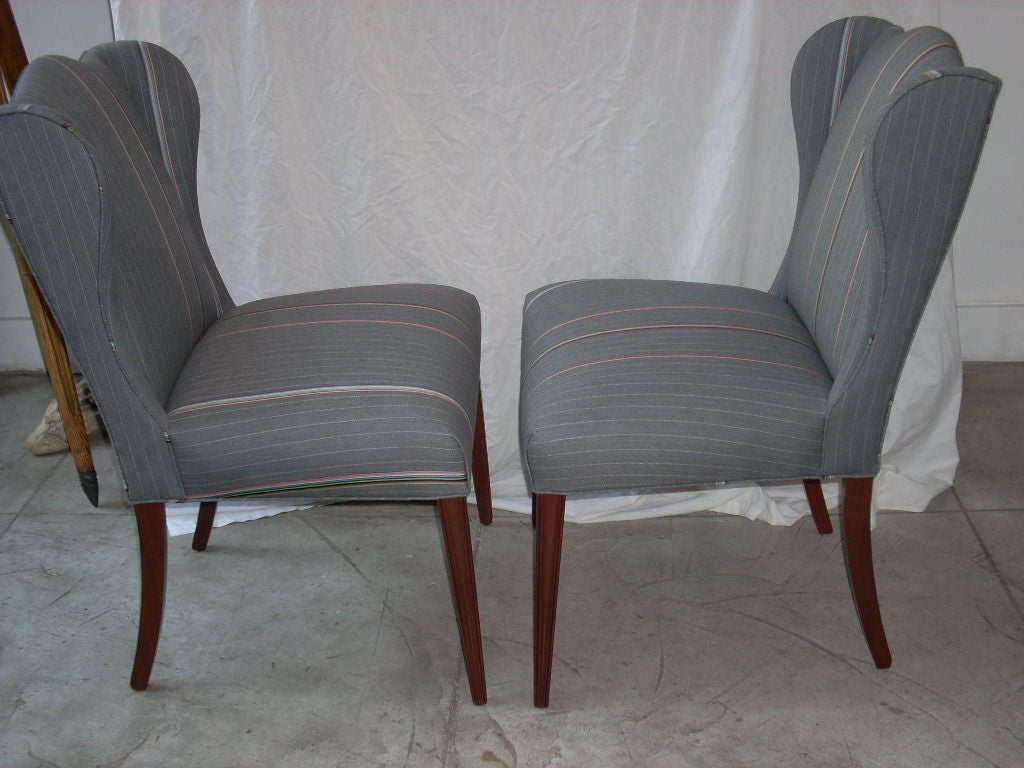 Unique pair of side chairs with new upholstery in Bespoke stripe grey Paul Smith fabric.
