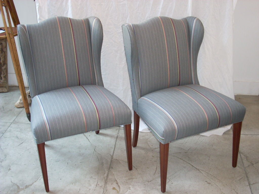 American Pair of petite wing back chairs in Paul Smith fabric