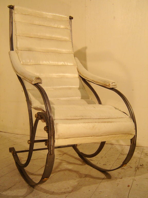 This is the rocker to end all rockers, designed by Winfield in the 1880's this chair is completely made in cast iron unlike some which are wrought. This model is cast into sand from a mould which shows that this is an original design (some wrought