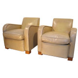 A pair of original cream leather club chairs