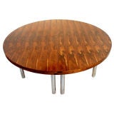 A 7ft round Rosewood Dining table/pair of console tables