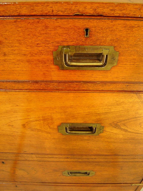 A Teak English Military Campaign chest by Army and Navy, London 1