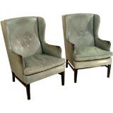 A Pair of Swedish 1960's verdigris hide leather wing arm chairs.