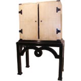 A vellum chest on stand