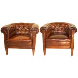 A stunning pair of period leather Swedish armchairs c1920