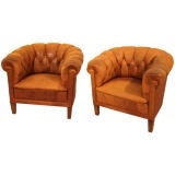 A pair of period leather club chairs c1920