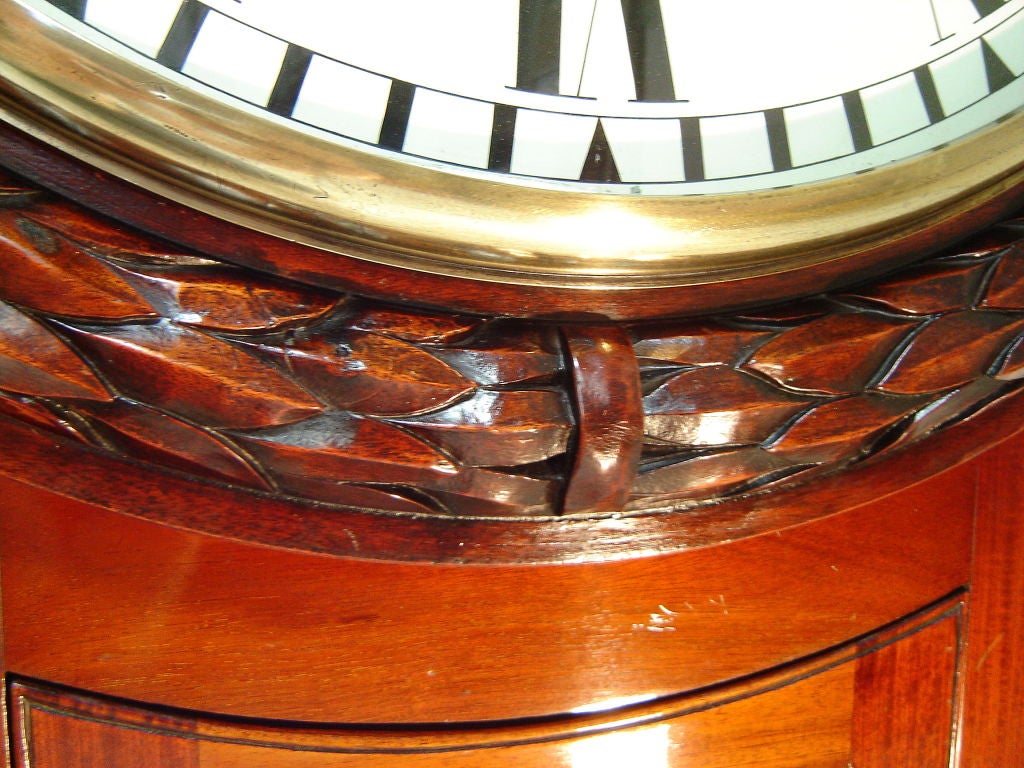 This is a massive and elegant clock with a 7 day pendulum movement. The carved mahogany frame is there to represent sheaves of corn and these clocks were to be found in the Corn Exchange of a large town in the late 19th century. There is a huge