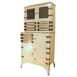 A 1900's medical cabinet with nickel fittings