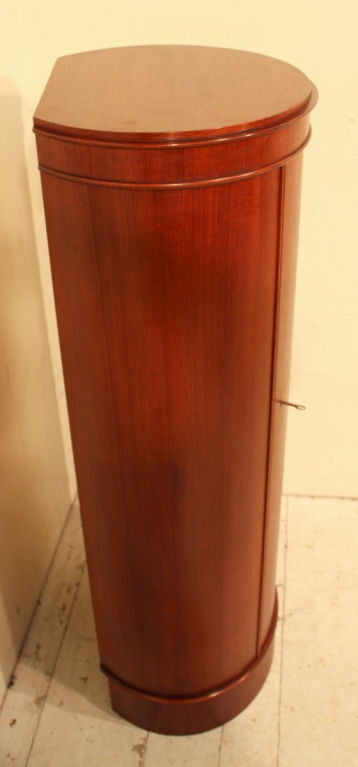 A Danish teak  round cabinet c1960