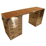 A Swedish Campaign military desk/cabinets in polished steel