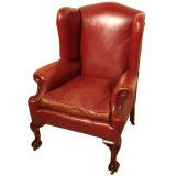A single leather wing armchair c1900