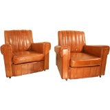 A pair of original leather 1940's armchairs
