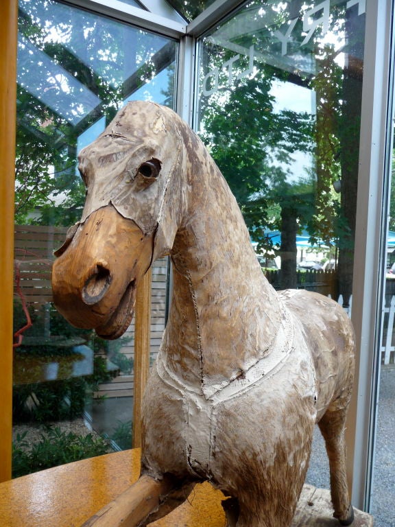 Beautiful  Hobby Horse Deconstructed to Reveal Original Parchment, Wood and Horsehair Materials With Glass Eyes. On Painted Wooden Stand With Iron Wheels.