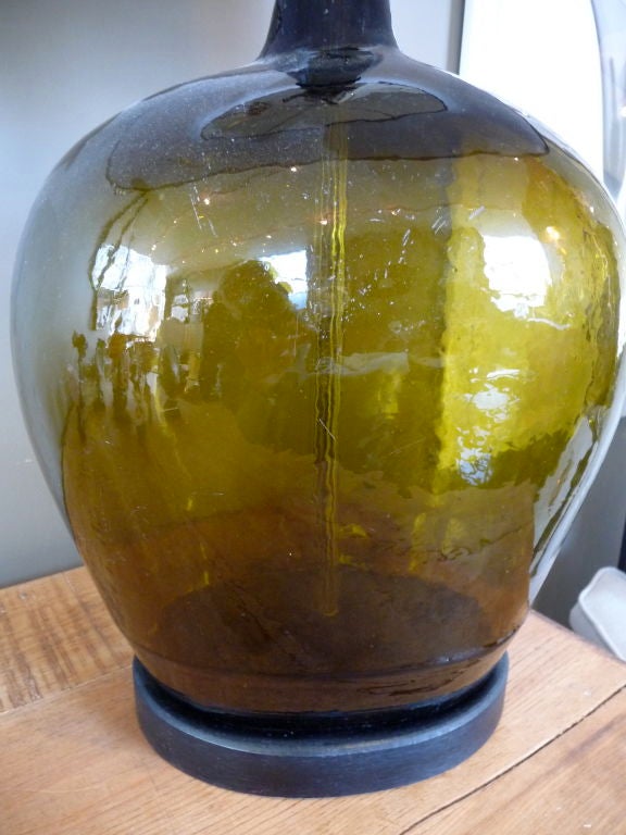 Beautiful Green/Gold Demijohn Made Into Lamp. Taupe Colored Linen Shade On Wooden Base. Dimensions Include Shade