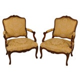 A Pair of French Louis XV Walnut Fauteuil a La Reine, C1730