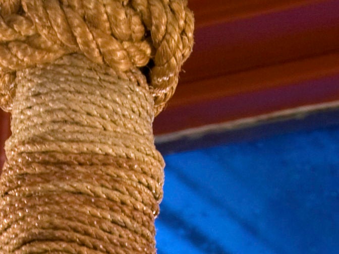 The braided rope chandelier has iron bobeche.  It has been wired in the US.  This would be perfect for a beach home.  It has a timeless look and has a beautiful color.