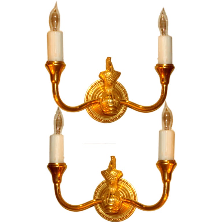 Pair of gold plated dolphin sconces at 1stdibs