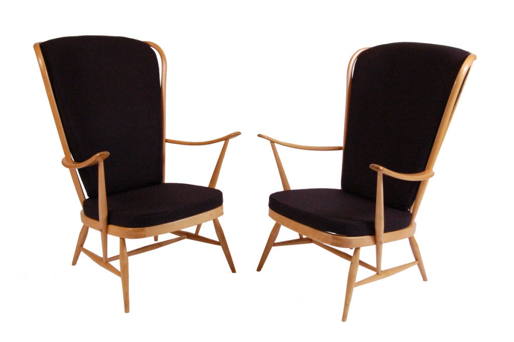 Nice pair of Windsor chairs with modern styling; beech frame with new glazed linen upholstery. Made by Ercol.