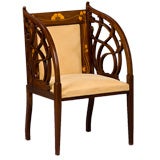 A Mahogany Tub Chair inlaid with Light Woods by JS Henry