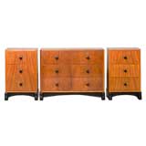 A Chest of Drawers with matching pair of Bedside Cabinets