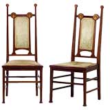 A Pair of inlaid Mahogany Sidechairs by J.S. Henry