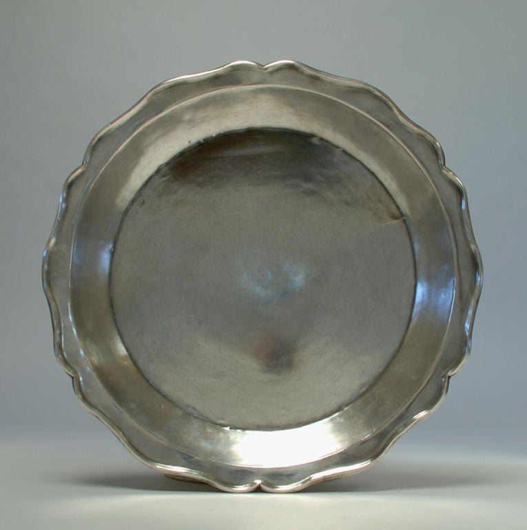 A superb 18th century Spanish colonial silver wedding charger of circular form with scalloped edge. Inscribed 