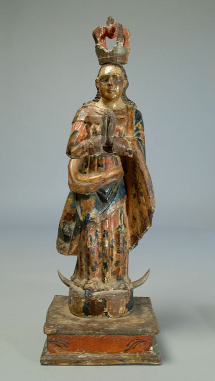 A good 18th century Spanish colonial carved and polychrome painted madonna - La Purisima with the crescent moon and serpent underfoot. <br />
<br />
Dimensions: measures 22.25 inches high.
