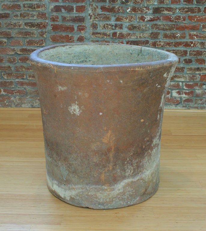 A massive 19th century water repository with calcified water deposits and beautiful surface patina throughout. Philippines - circa 1850. The small jar is shown for scale only and is not part of this listing.<br />
<br />
Dimensions: 29 inches high