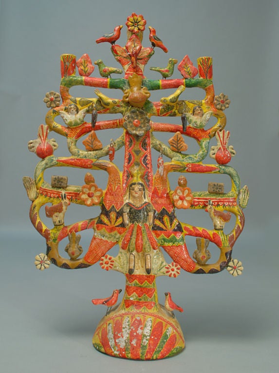 A superb 26 inch vintage Mexican tree of life candelabra with berries, standing birds and colorful flower blossoms throughout. Attributed to Aurelio Flores - Circa 1940's. Small jar is shown for scale only and is not part of this listing. <br