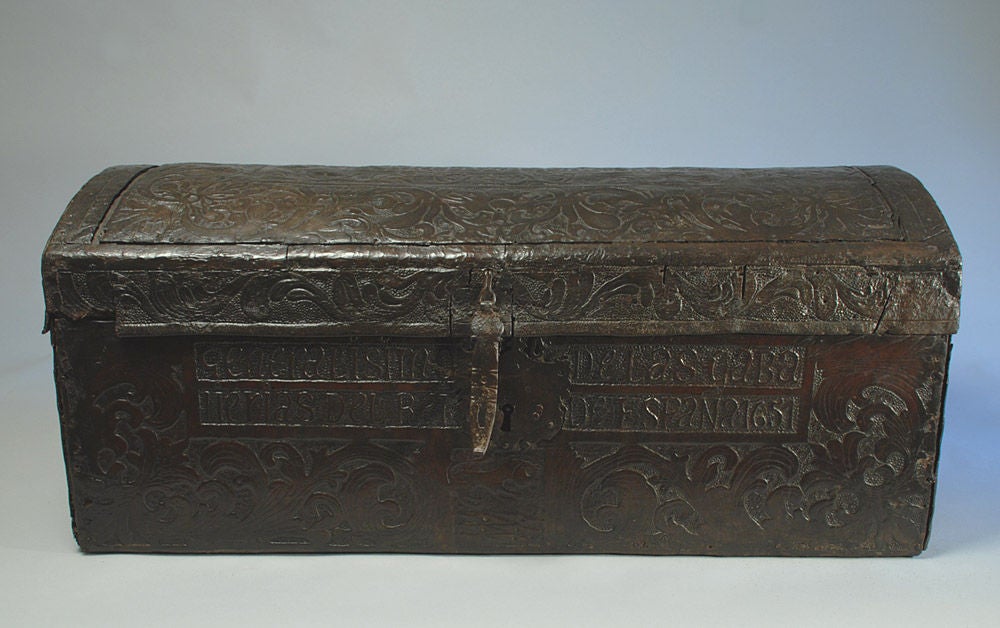 A very rare 17th century hand tooled and embossed leather Spanish colonial baul. Original hasp, lock-plate and hinges. Dated 1651.<br />
<br />
Dimensions: 42 inches x 18 inches x 19 inches.