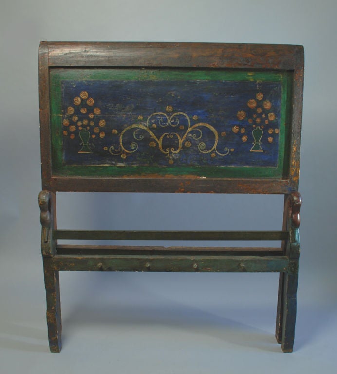 A mid 19th century polychrome painted Spanish bed with foliate motifs and botanical urns. In excellent working condition with original rails and slats (not shown). <br />
<br />
Headboard measures 60 inches high x 48 inches wide. Footboard