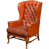 Antique English red leather wing chair