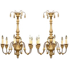 Pair of French giltwood and iron 6-light chandeliers Pair of French giltwood and iron 6-light chandeliers