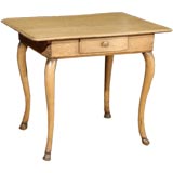 Antique English table with cabriole legs and hoof feet
