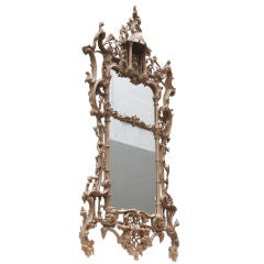 A carved giltwood Chippendale period two plate pier mirror
