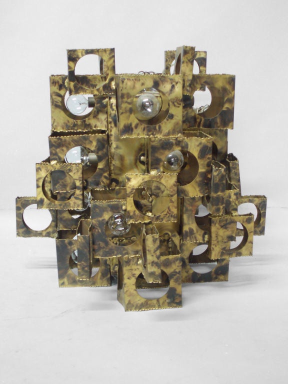 A Torch Cut Copper Sheet Metal Hanging Lamp