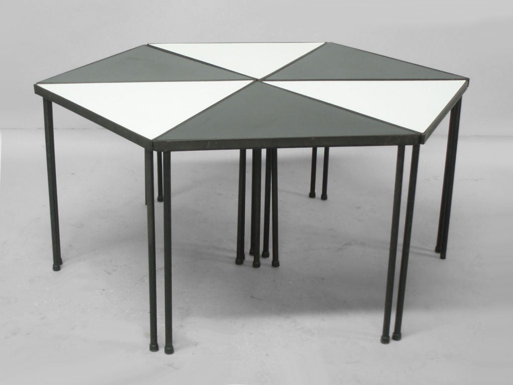 A Series of Six Triangle Stack Puzzle Tables Attributed to Peter Pepper. Black and White Laminate, Wrought Iron.<br />
Each  Piece: 17.25