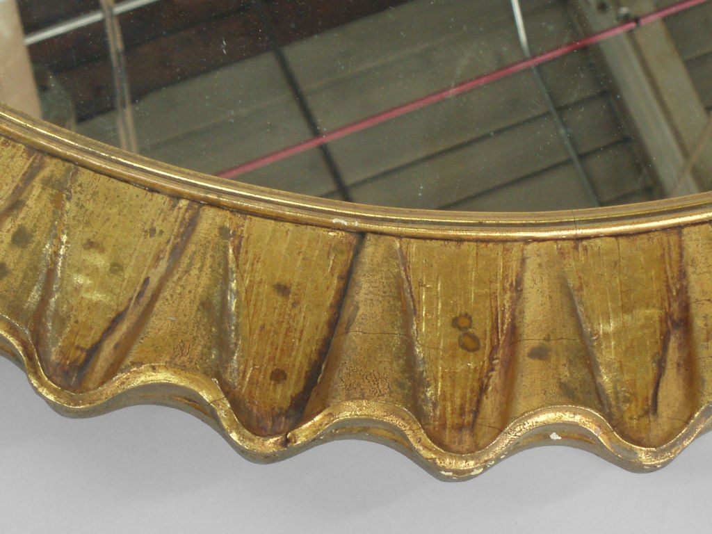 A Gold Scalloped Frame Round Mirror