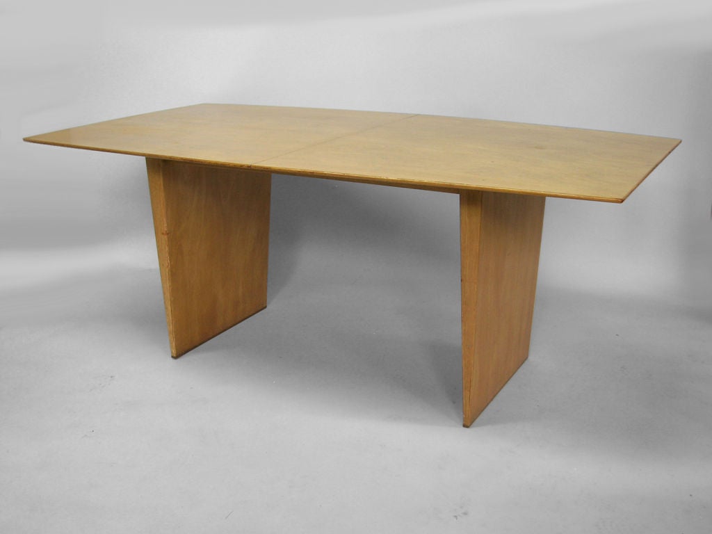 A Brass Cap Plinth Base Dining Table by Edward Wormley