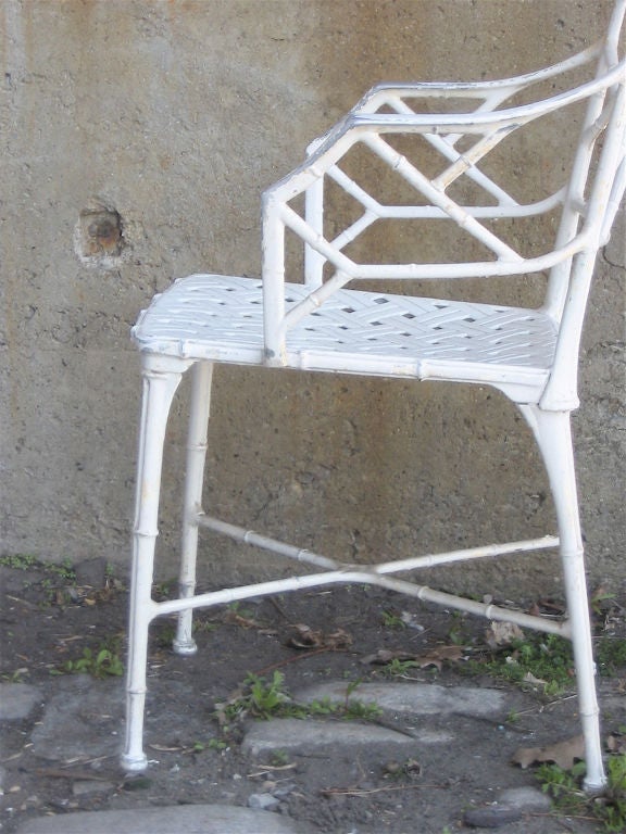 Pair Brown Jordan Faux Bamboo Cast Aluminum Arm Chairs. Great Neo Classic style and quality.