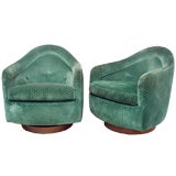 A Pair Swivel Tilt Lounge Chairs by Harvey Probber