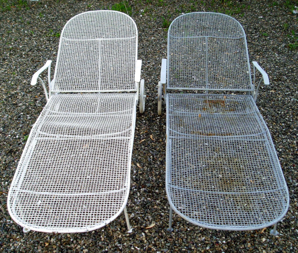 A matched pair of wrought iron mesh Sculptura collection chaise lounges by Russell Woodard with adjustable backrest.