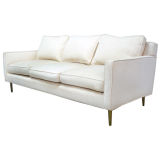 A White Couch on Brass Legs by Edward Wormley for Dunbar