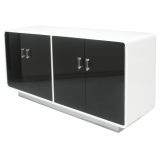 A Black and White Lacquered Cabinet
