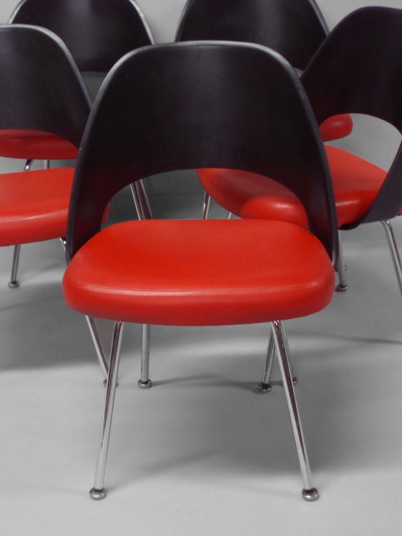 A Set of Six Fiberglass Back Dining Chairs by Eero Saarinen