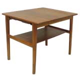 A Teak side table with slide out shelf by Hans J. Wegner