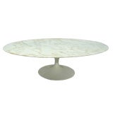 An Oval Marble Top Table with Iron Base by Eero Saarinen
